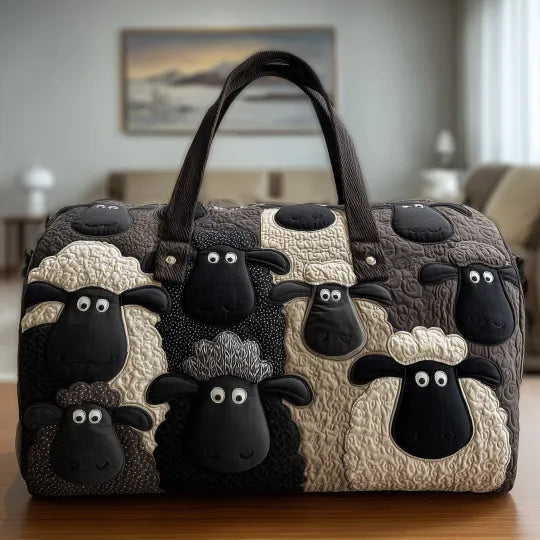 Schwarze gesteppte Reisetasche mit schwarz-weissen Schafen